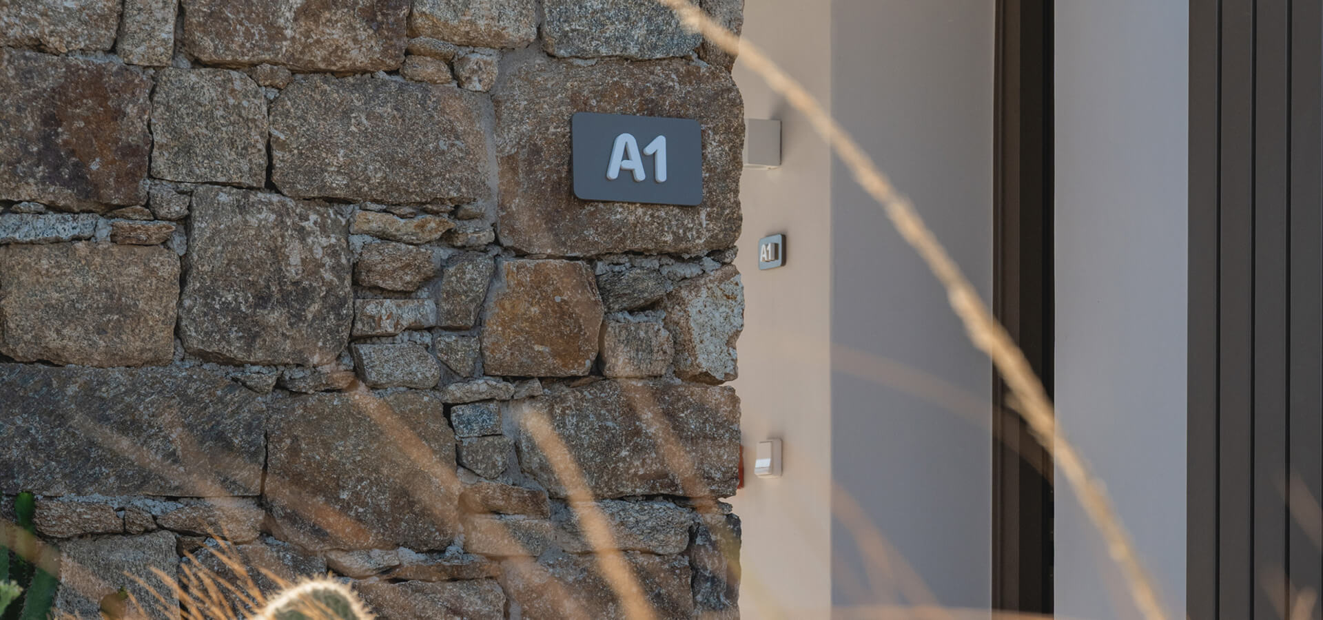 Signage on a stone wall