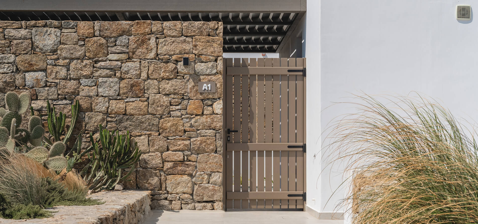 Island-style door of a suite with garden view
