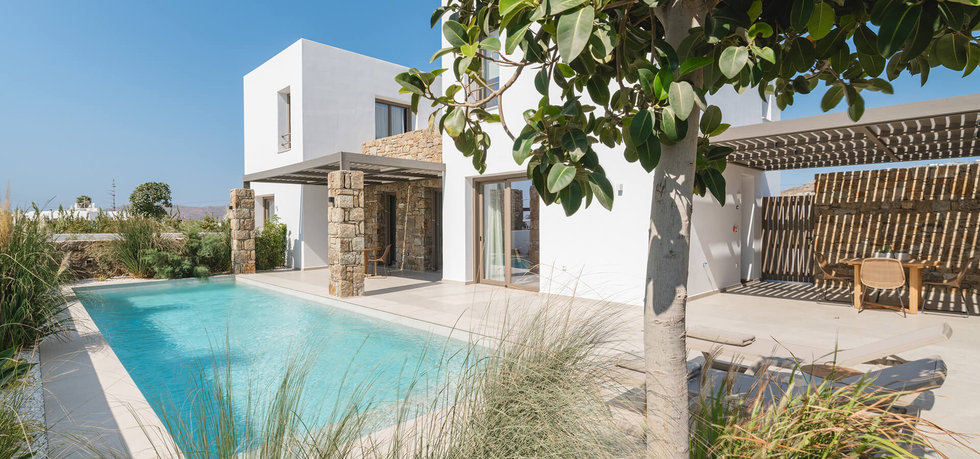Exterior of a suite with private pool and garden view